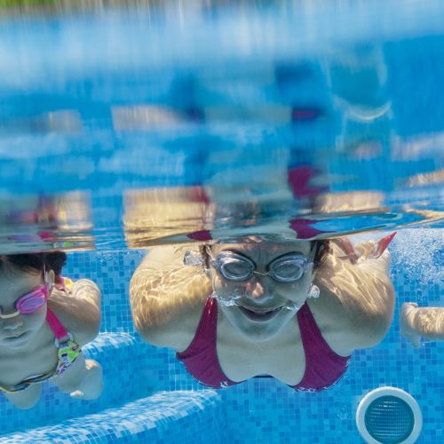 Family swimming underwater