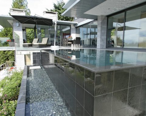 Reflecting pools built to create a seamless outdoor living area