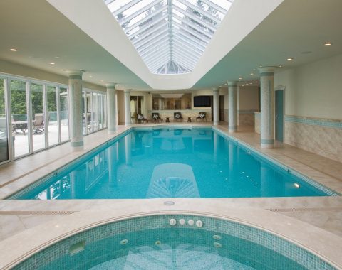 Luxury indoor swimming pool with spa