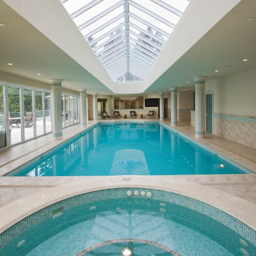 Luxury indoor swimming pool with spa