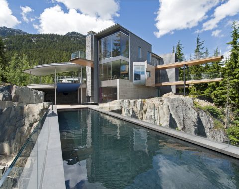 Infinity pool looking back at the house, showcasing the suspended portion