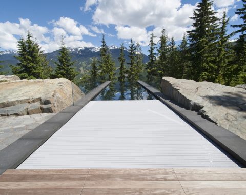 Wooden decking leading into the infinity pool