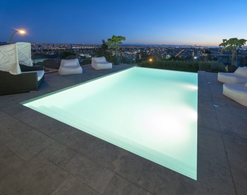 White plater infinity pool to show the tranquillity of water