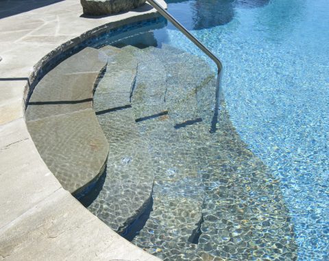 Natural steps leading down to the pool