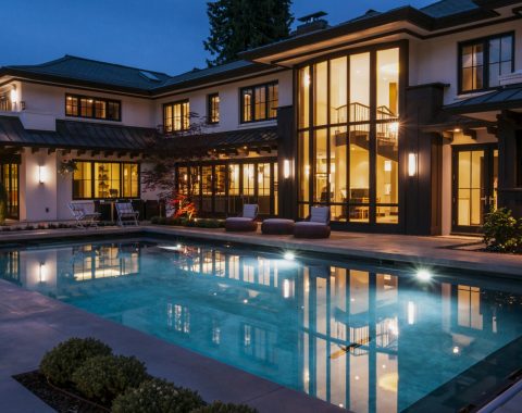 Modern swimming pool renovation with pool lighting