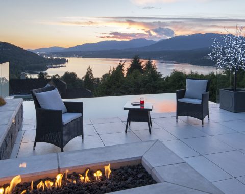 Infinity style patio with clear views and fire pit