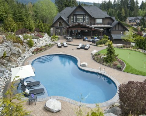 Freeform swimming pool blended into nature