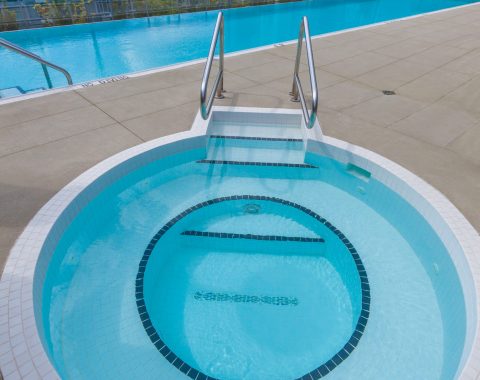 Outdoor commercial whirlpool with metal steps