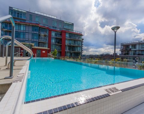 Large outdoor swimming pool with infinity edge