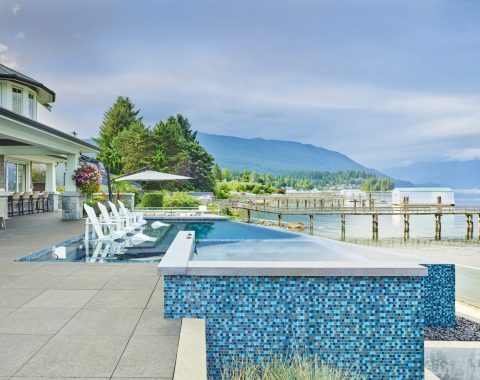 Infinity edge pool with a large range of outdoor seating areas