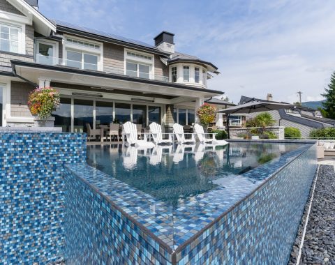Corner of the pool with the water trickling over the edge to create a feature