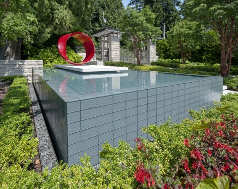 Reflecting pool with piece of art in the middle
