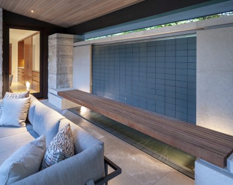 Outdoor living area with waterfall wall