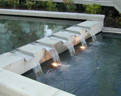 Commercial water features created as mini flowing water fountains