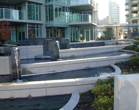 commercial water features for each pool outside of an apartment