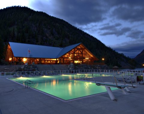 Commercial pool contractors created an outdoor pool with lanes and diving boards