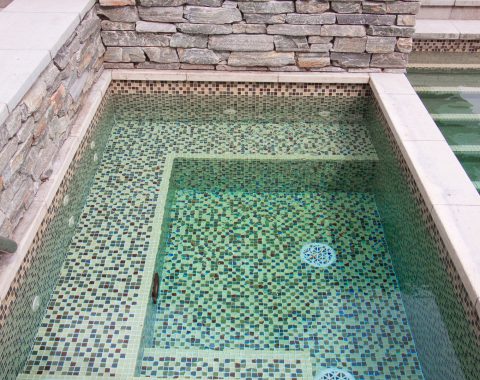 Large sized hot tub and spa with built in seating and water jets