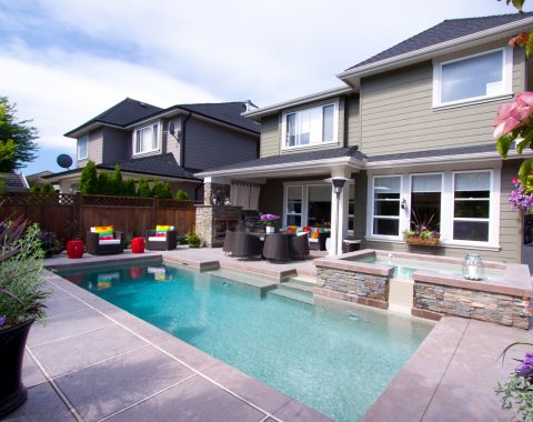 Cocktail pools in a backyard with built in spa in Burnaby, Vancouver & British Columbia