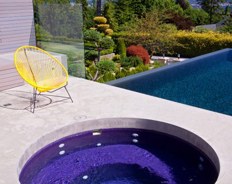 hot tubs and spas constructed with concrete surround separate from the main swimming pool