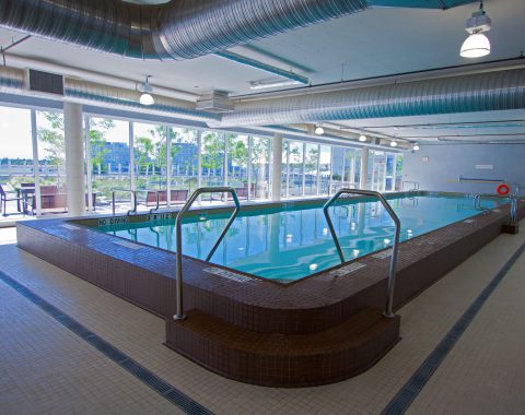 commercial pool contractors have created an indoor pool for a complex