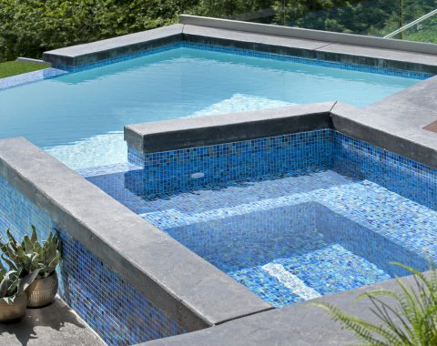Built in hot tub and spa that blends into the main swimming pool