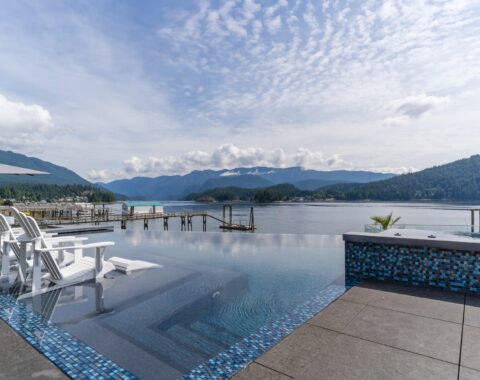 Infinity pool built to look over the bay with seamless views