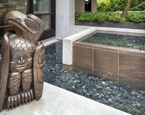 Reflecting pool used to create a calming look with different color pebbles at the bottom