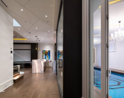 Luxury indoor swimming pool with grand entrance, perfect for private relaxation and fitness