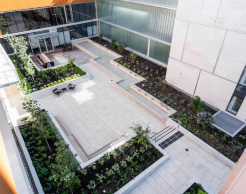 Aerial view of the commercial property Station Square 6 with a modern water feature design.